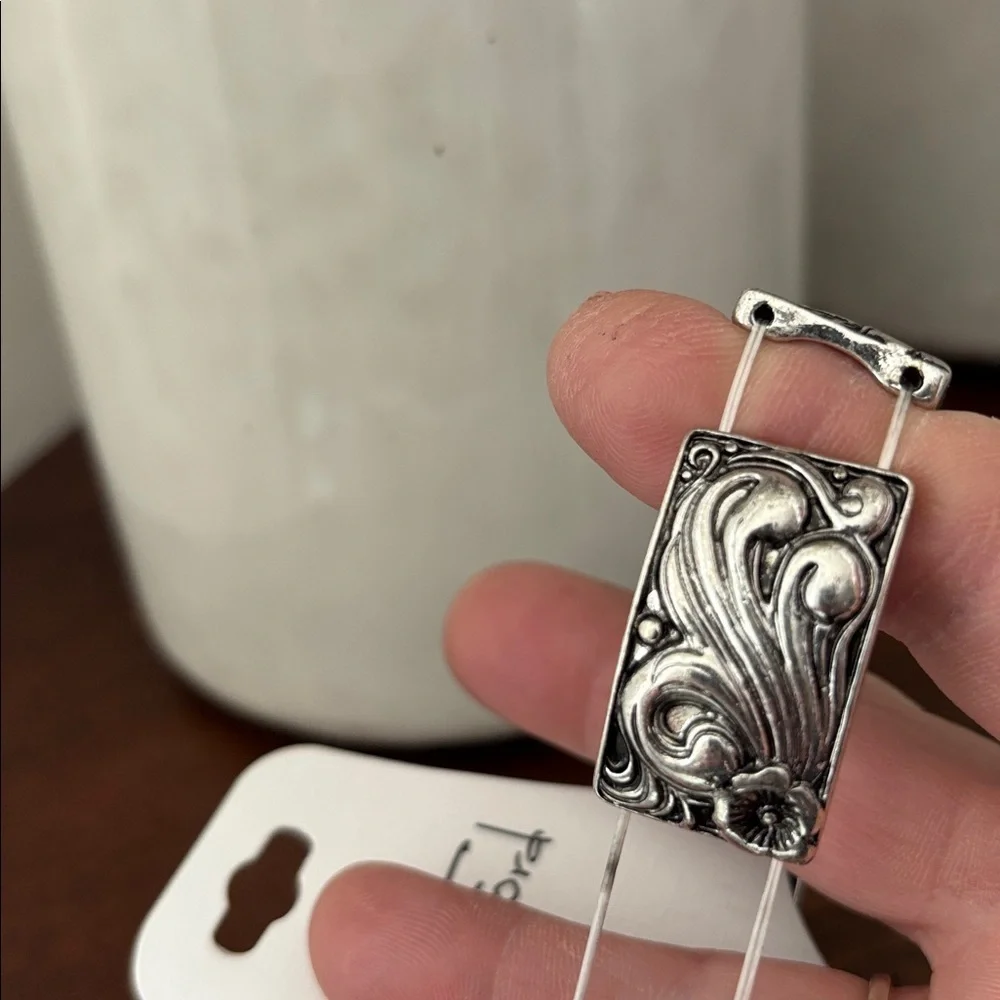 Laura Ford Stretch Silvertone Embossed scroll & floral bracelet